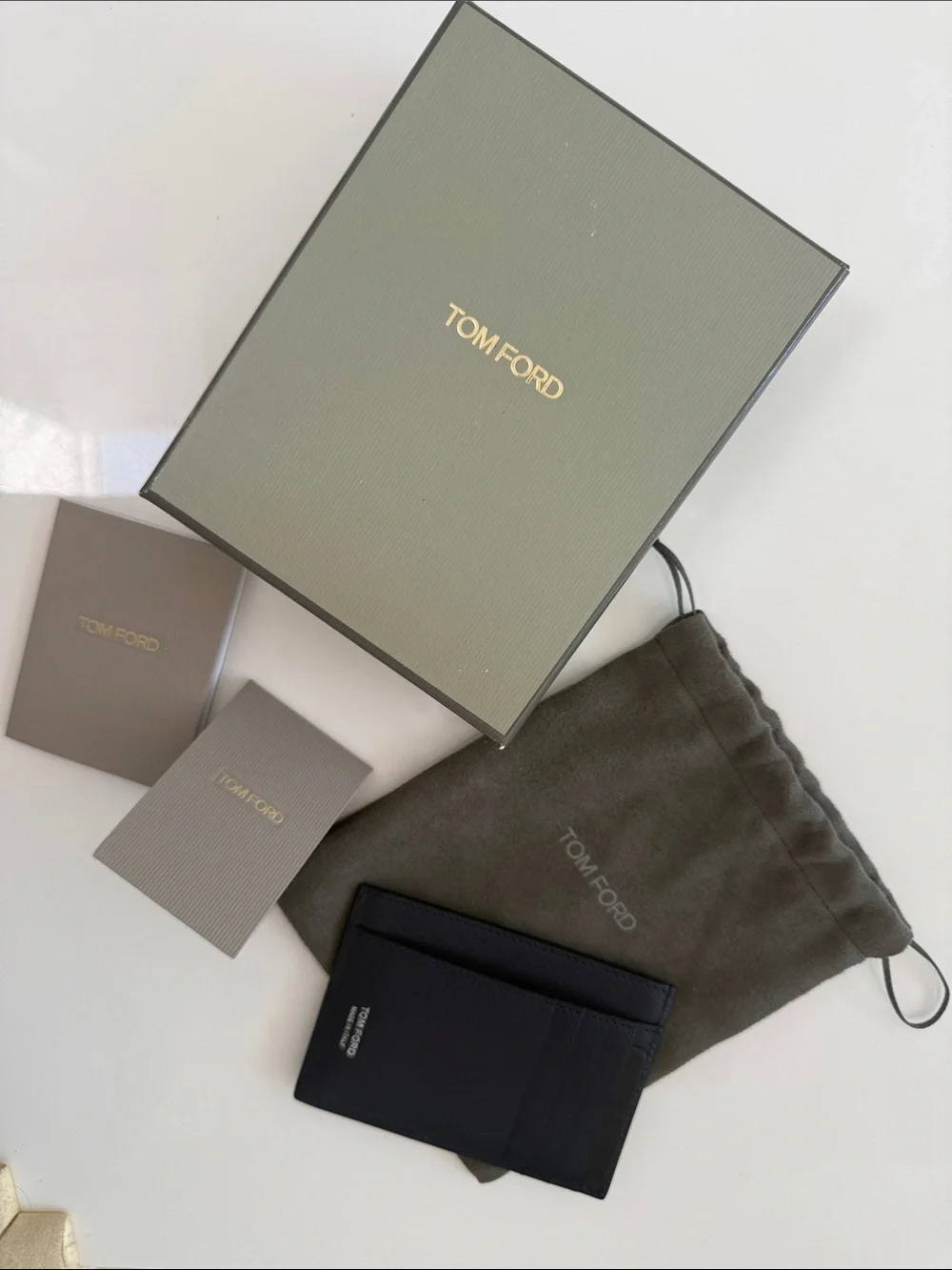 Tom Ford navy leather card holder with T-line detail